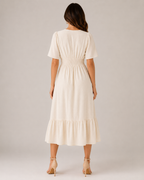 Marjolijn - Midi-jurk met V-hals en Tailleaccent