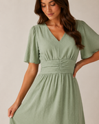 Marjolijn - Midi-jurk met V-hals en Tailleaccent