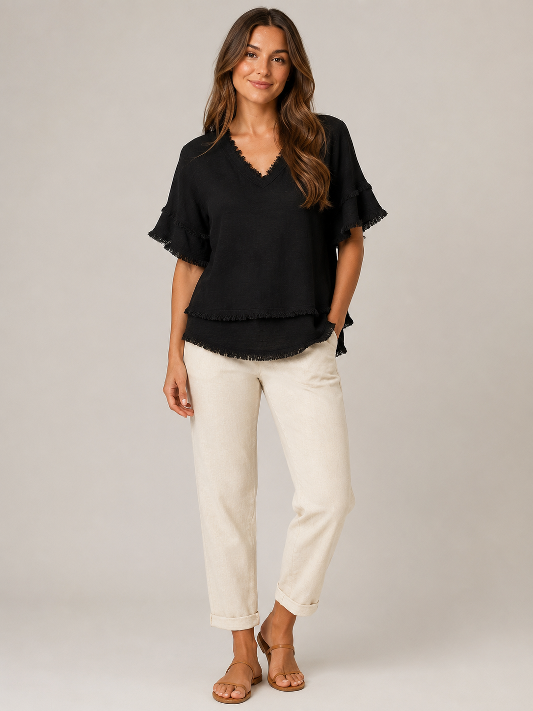 Sybeline - Losvallende damesblouse met V-hals en franjeranden