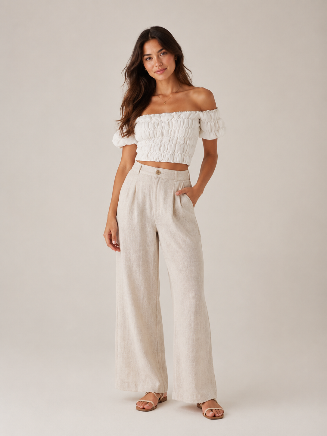 Tyndora - Off-shoulder croptop met smockdetail en pofmouwen