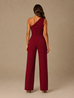 Gianelle - One-shoulder jumpsuit met drapering en strikceintuur
